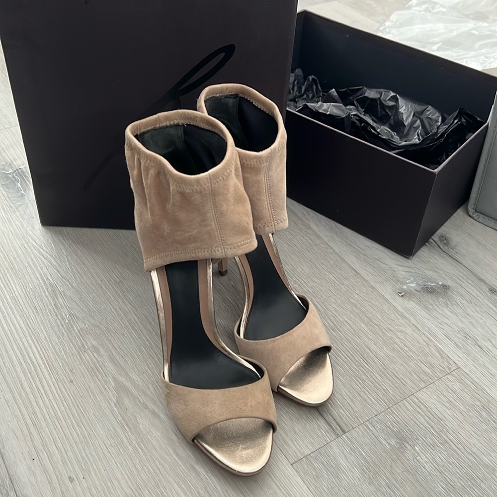 Brian Atwood shoes. I bought them on sale years ago but never wore them myself.